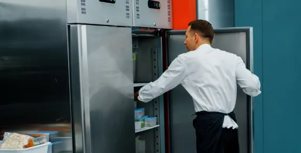 waiter opening fridge